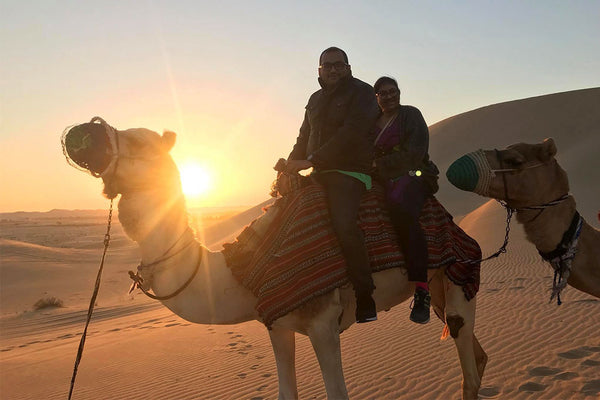 People riding camels