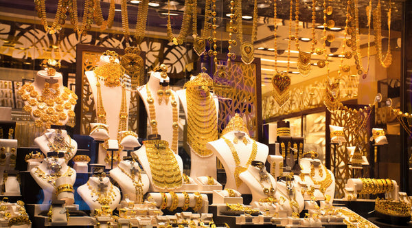 collection of gold jewelry, characteristic of the famous Dubai Gold Souk