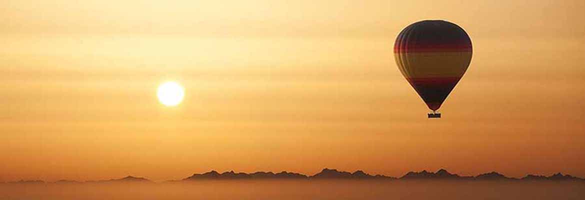 Экзотический восход солнца с полетами на воздушном шаре, прохладительными напитками, завтраком и трансфером туда и обратно