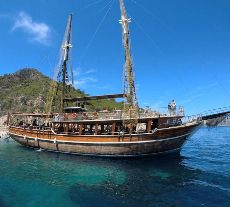 Расслабляющая прогулка на лодке по Кушадасы с трансфером туда и обратно. 