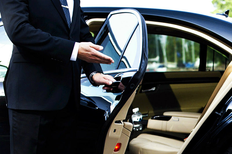 Man opening door of car