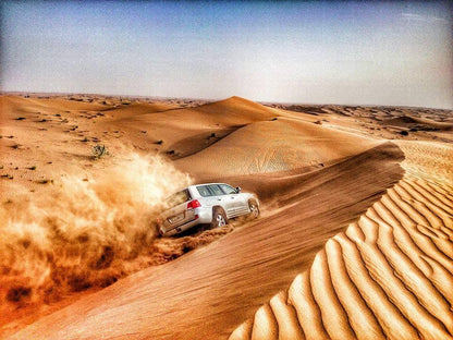 Ras Al Khaimah Desert Safari, Dune Bashing, Camel Riding, Live Entertainment & BBQ Dinner From Dubai