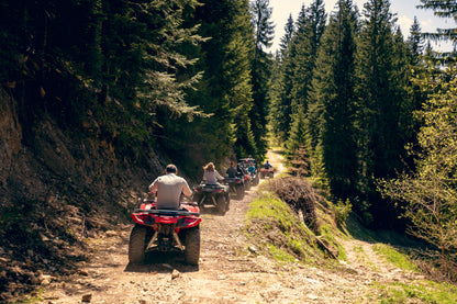 People riding ATV Quad