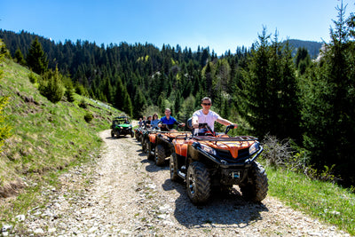 People riding ATV Quad