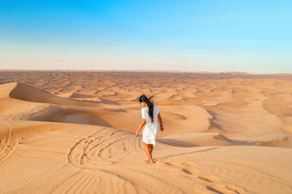 Girl walking in desert