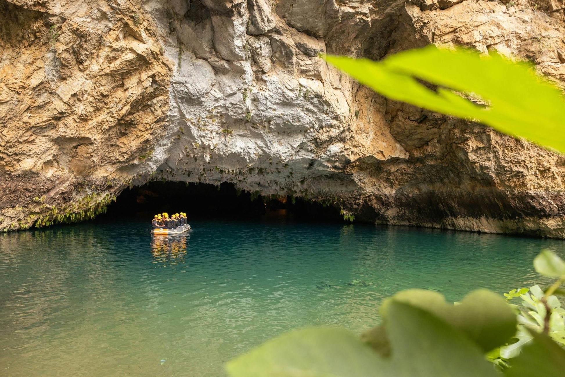 People entering Altinbesik Cave