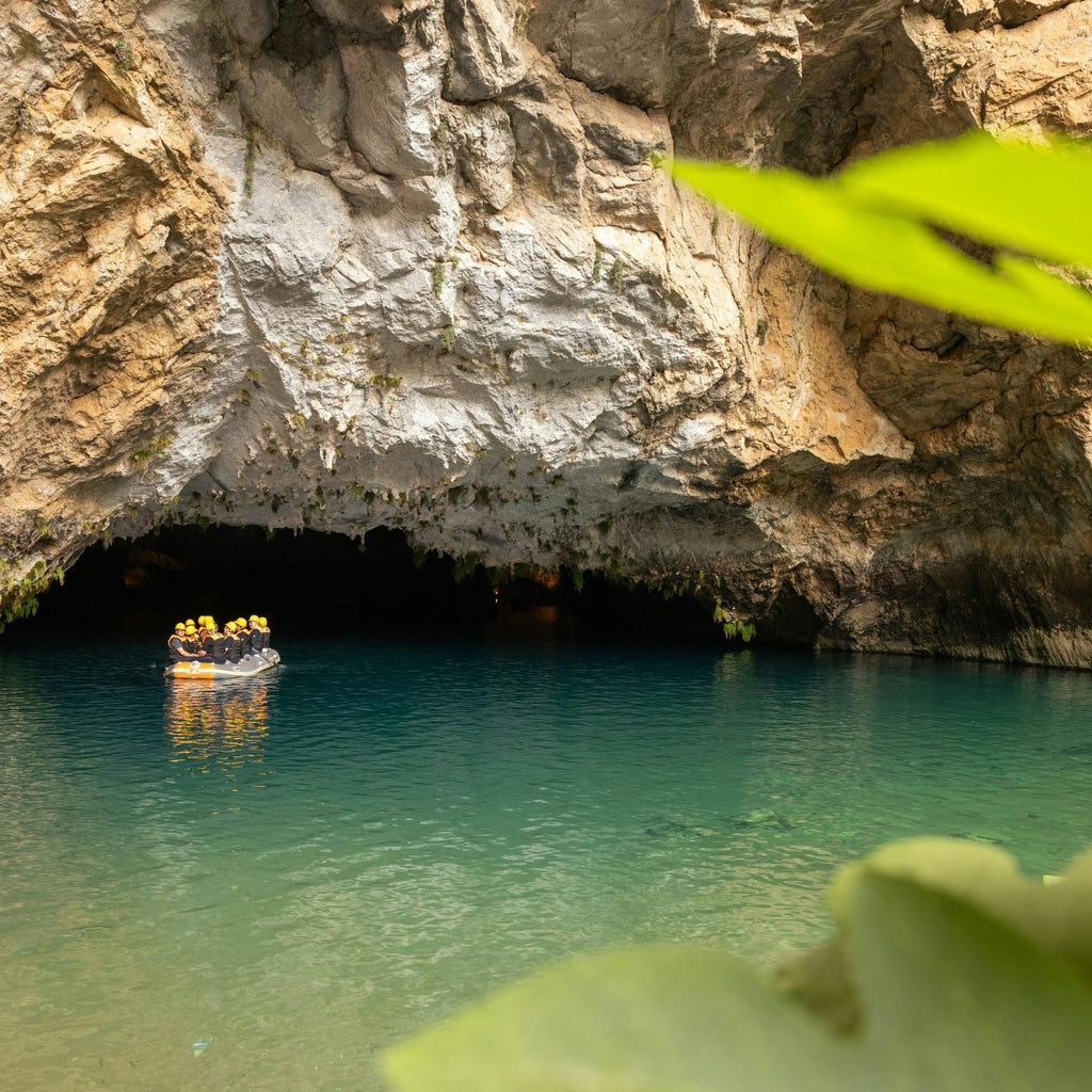 People entering Altinbesik Cave