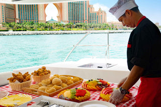 Chef preparing a meal on a yacht during a cruise in Dubai